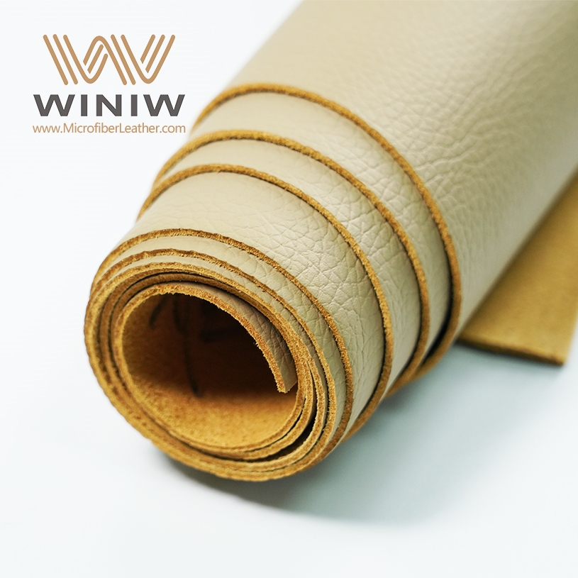 This fabric material is made from high-quality synthetic fibers that mimic the feel and look of genuine leather while.